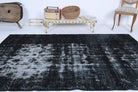 Nuraysegul rug: 1960s handmade Anatolian rug with solid motifs and cotton backing
