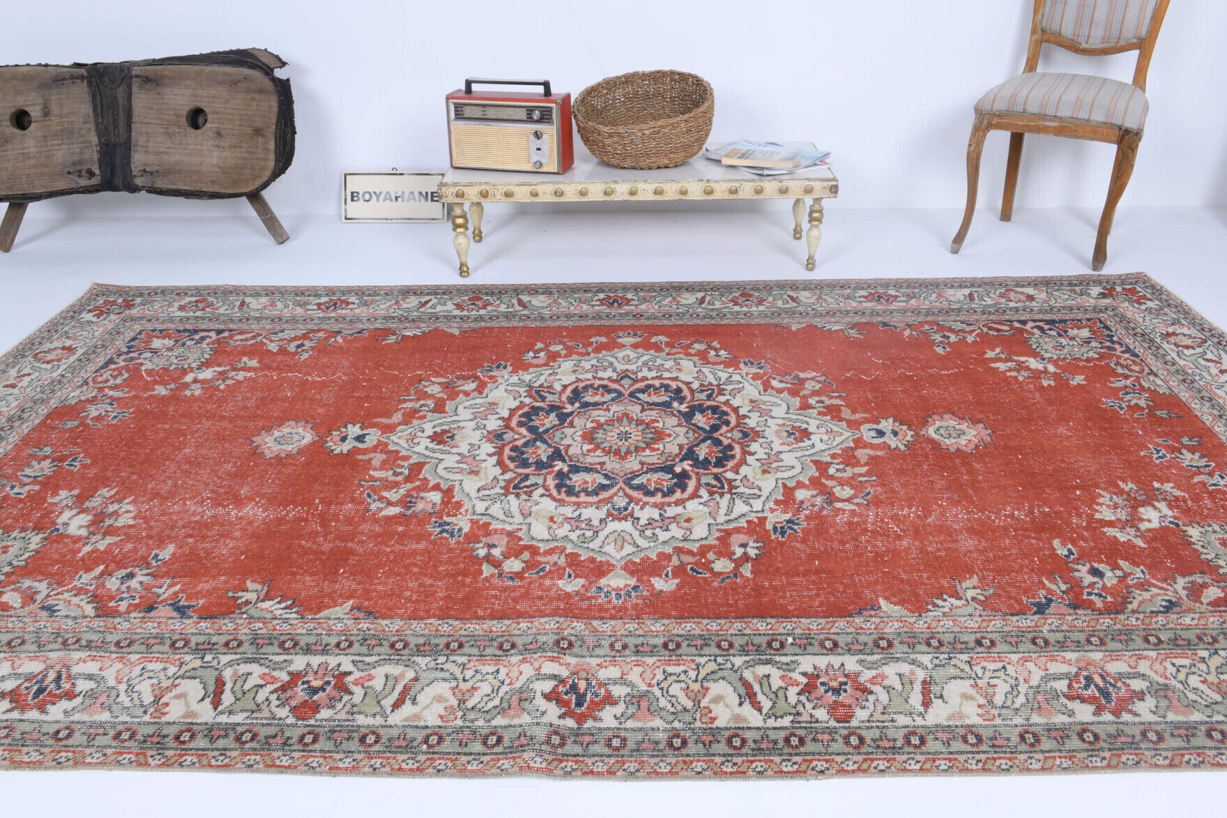 Nevmelek rug: 1970s handmade Anatolian rug with medallion motifs and cotton backing