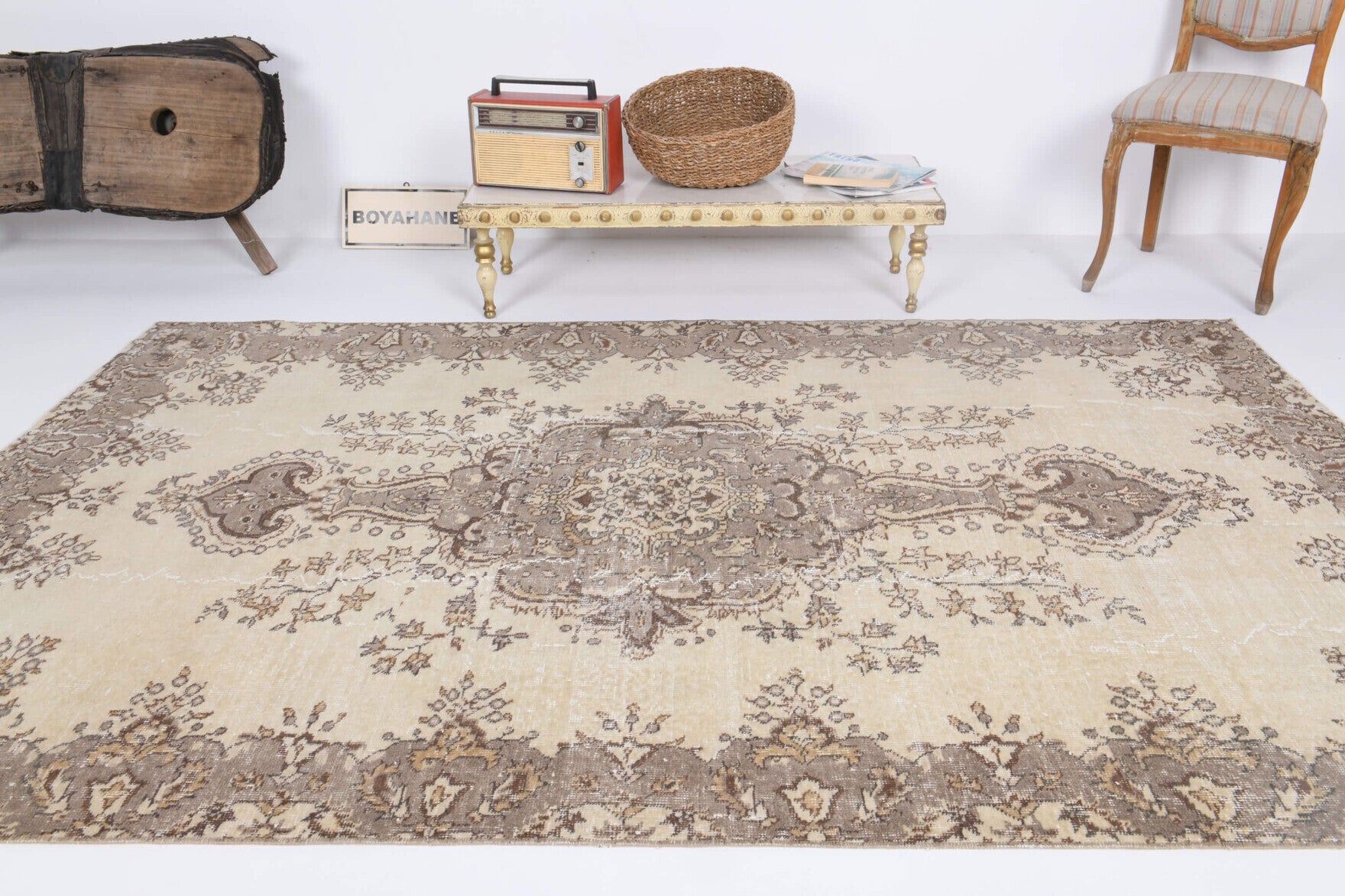 Nevingul rug: 1970s handmade Anatolian rug with oriental motifs and cotton backing