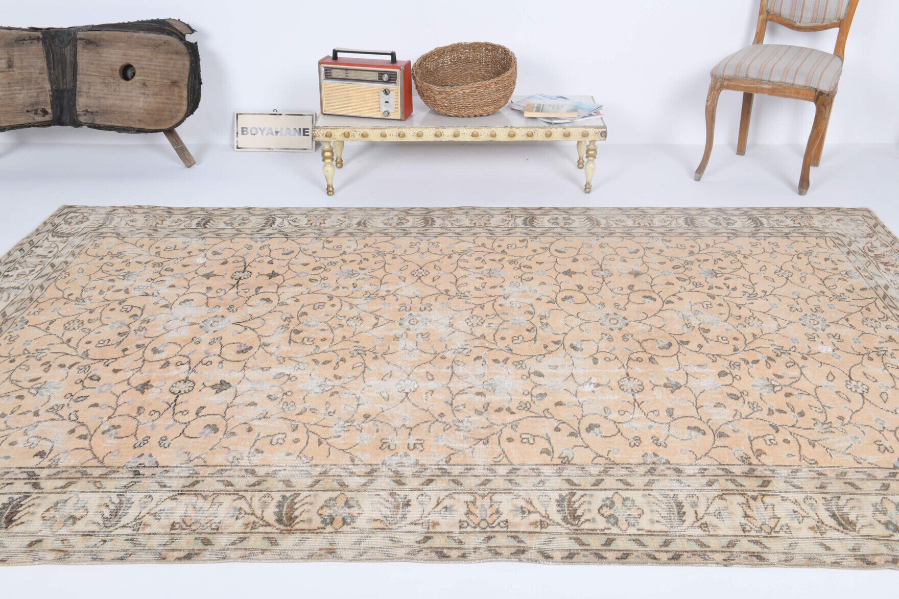Naiaphora rug: 1970s handmade Anatolian rug with floral motifs and cotton backing