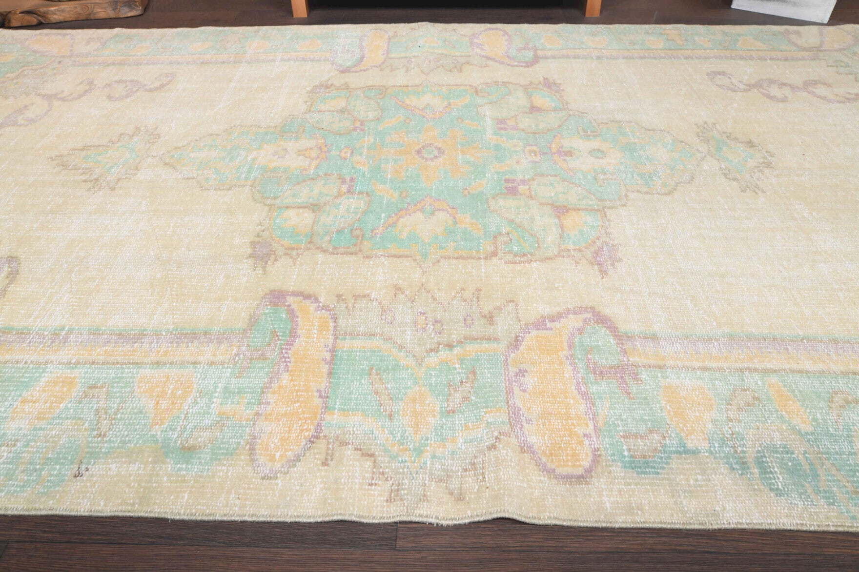 Nadide rug: 1970s handmade Anatolian rug with floral motifs and cotton backing
