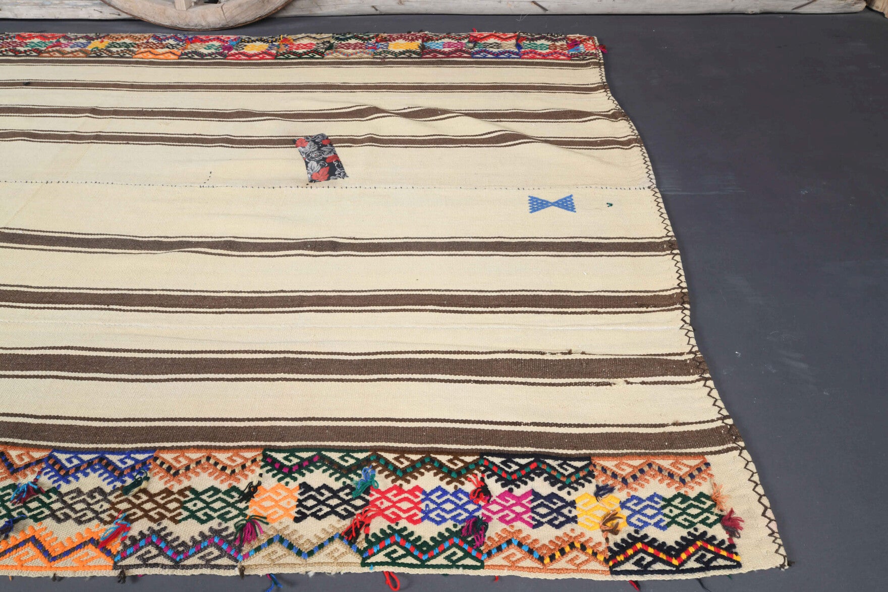 Serinban kilim: 1960s handwoven flatweave Anatolian kilim with striped motifs