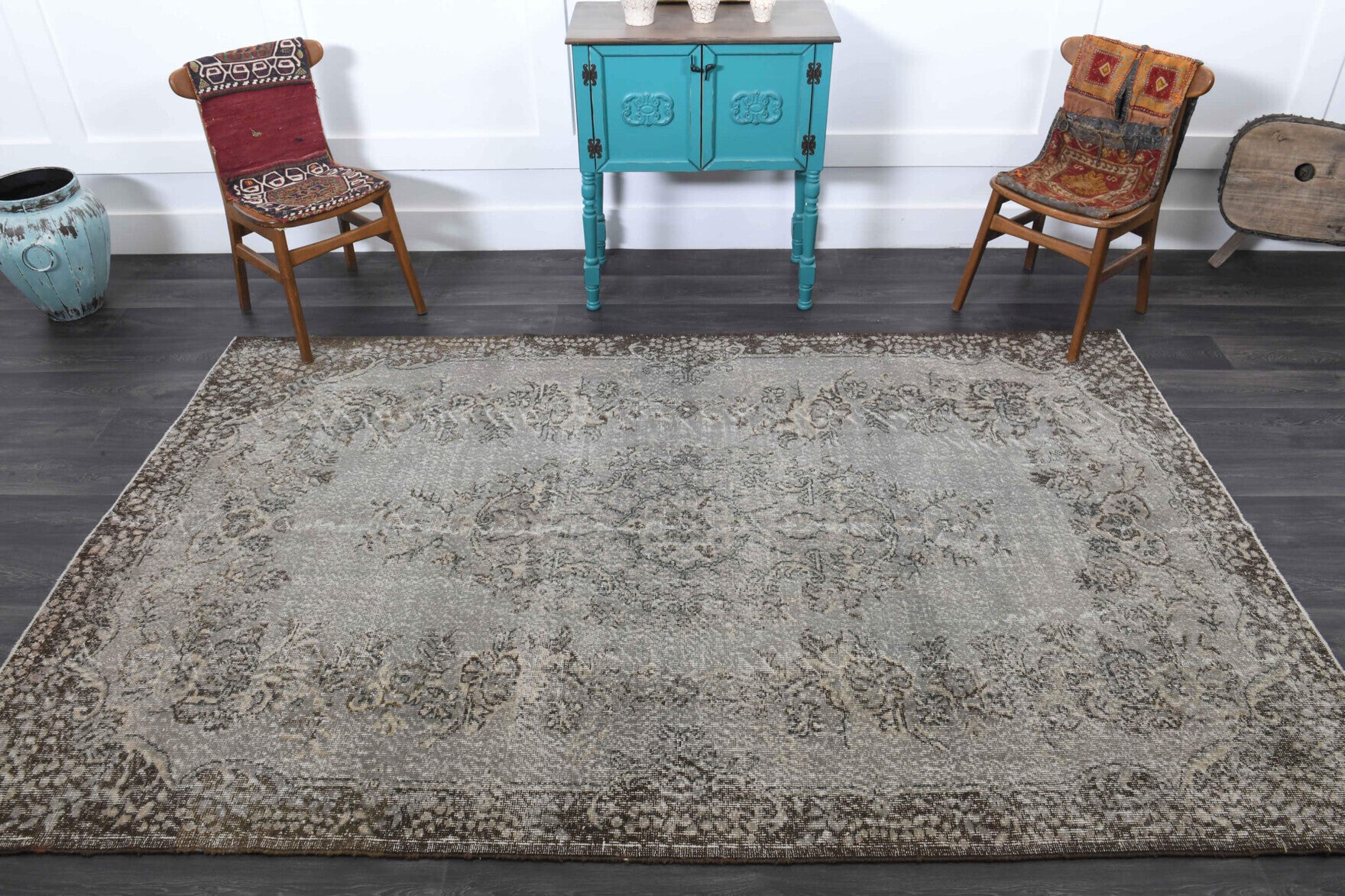 Tire rug: 1970s handmade Anatolian rug with oriental motifs and cotton backing