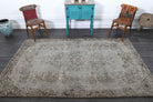 Tire rug: 1970s handmade Anatolian rug with oriental motifs and cotton backing