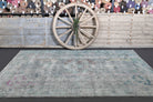 One-of-a-kind 1950s Anatolian distressed vintage area rug in wool, 5'9" x 9'4"