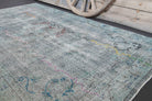 Pervalale rug: 1950s handmade Anatolian rug with oriental motifs and cotton backing