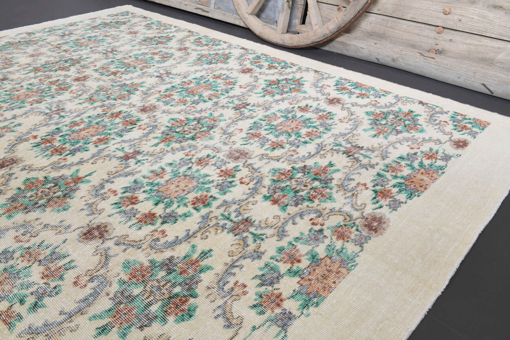 Pembeter rug: 1970s handmade Anatolian rug with floral motifs and cotton backing