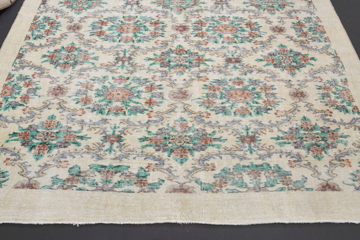 Handmade wool rug from Anatolia, Turkey – Allover Floral Hereke Vintage Rug 6'8" x 9'10"
