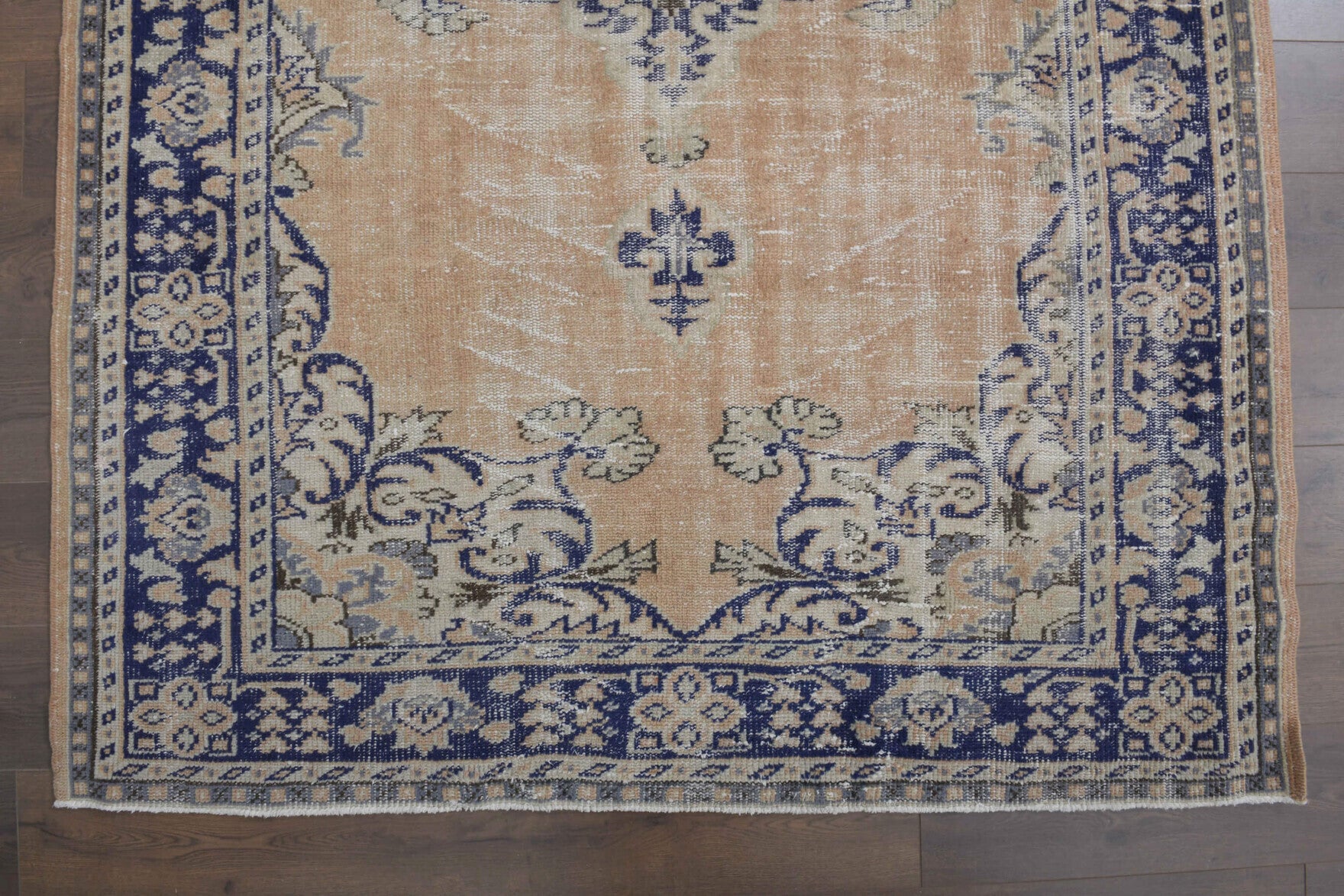 Okeanodike rug: 1970s handmade Anatolian rug with oriental motifs and cotton backing