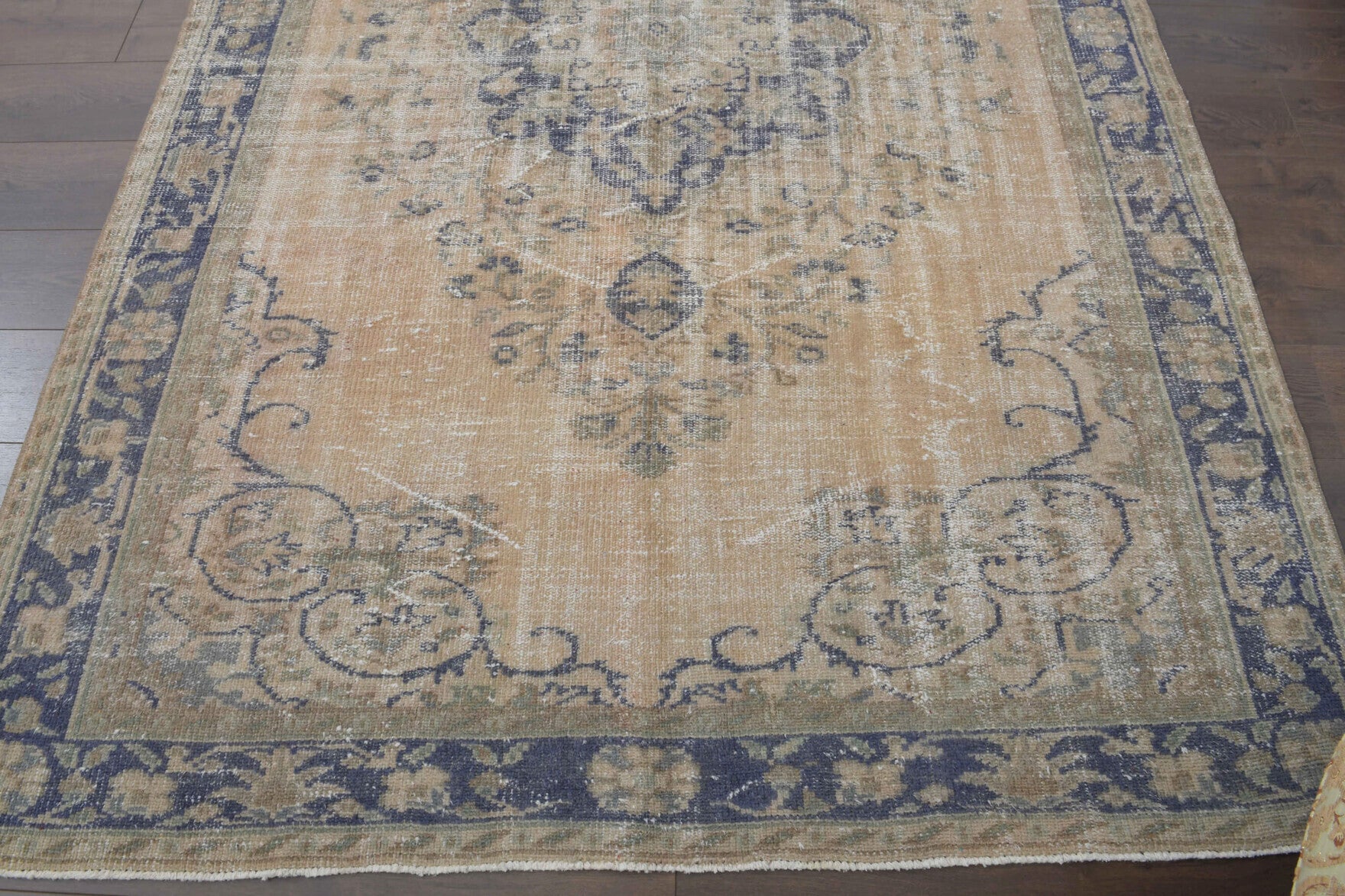 Nuraynaz rug: 1970s handmade Anatolian rug with oriental motifs and cotton backing