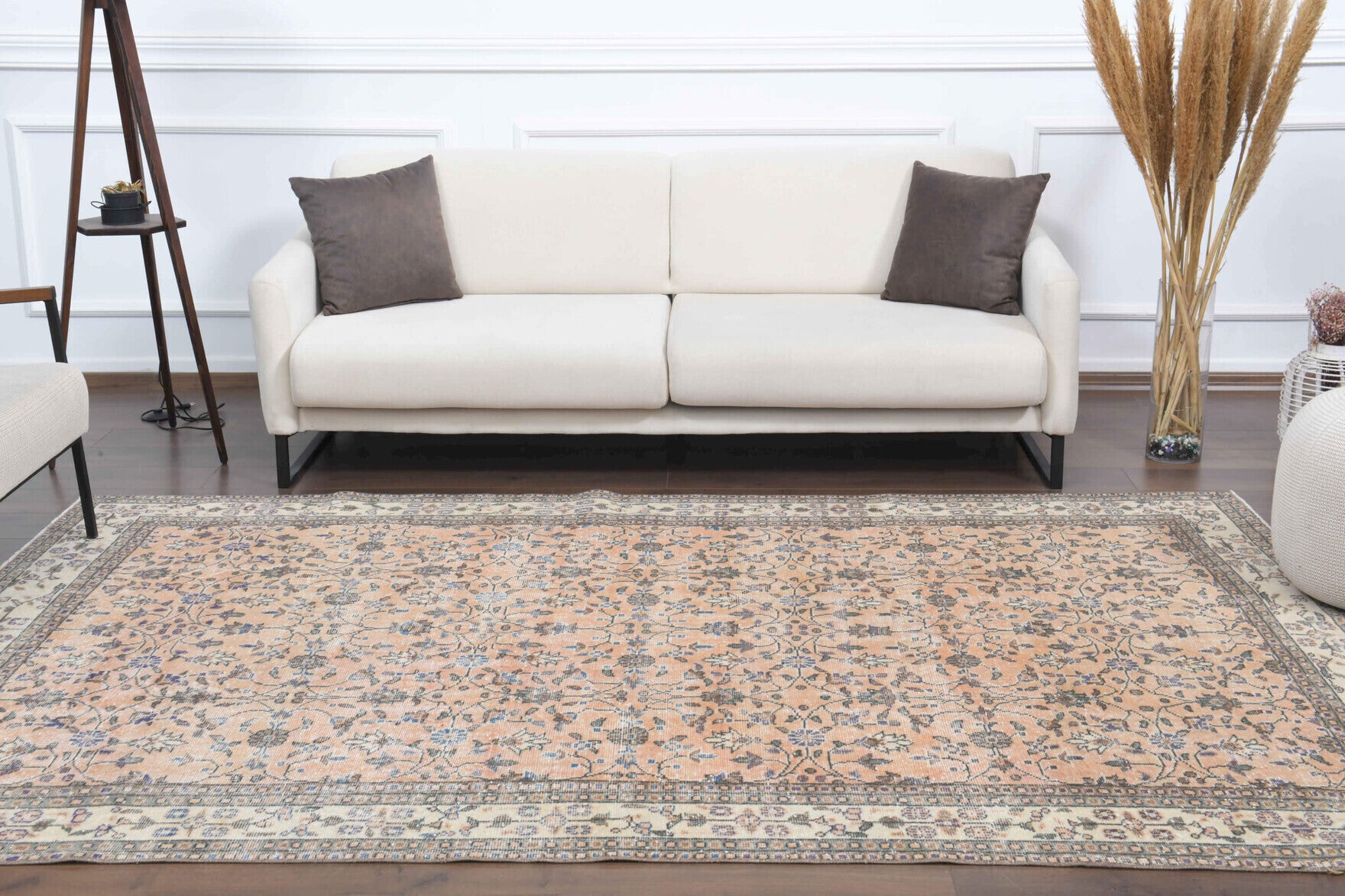 Pervasever rug: 1970s handmade Anatolian rug with floral motifs and cotton backing