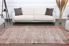 Phaenochoria rug: 1970s handmade Anatolian rug with floral motifs and cotton backing