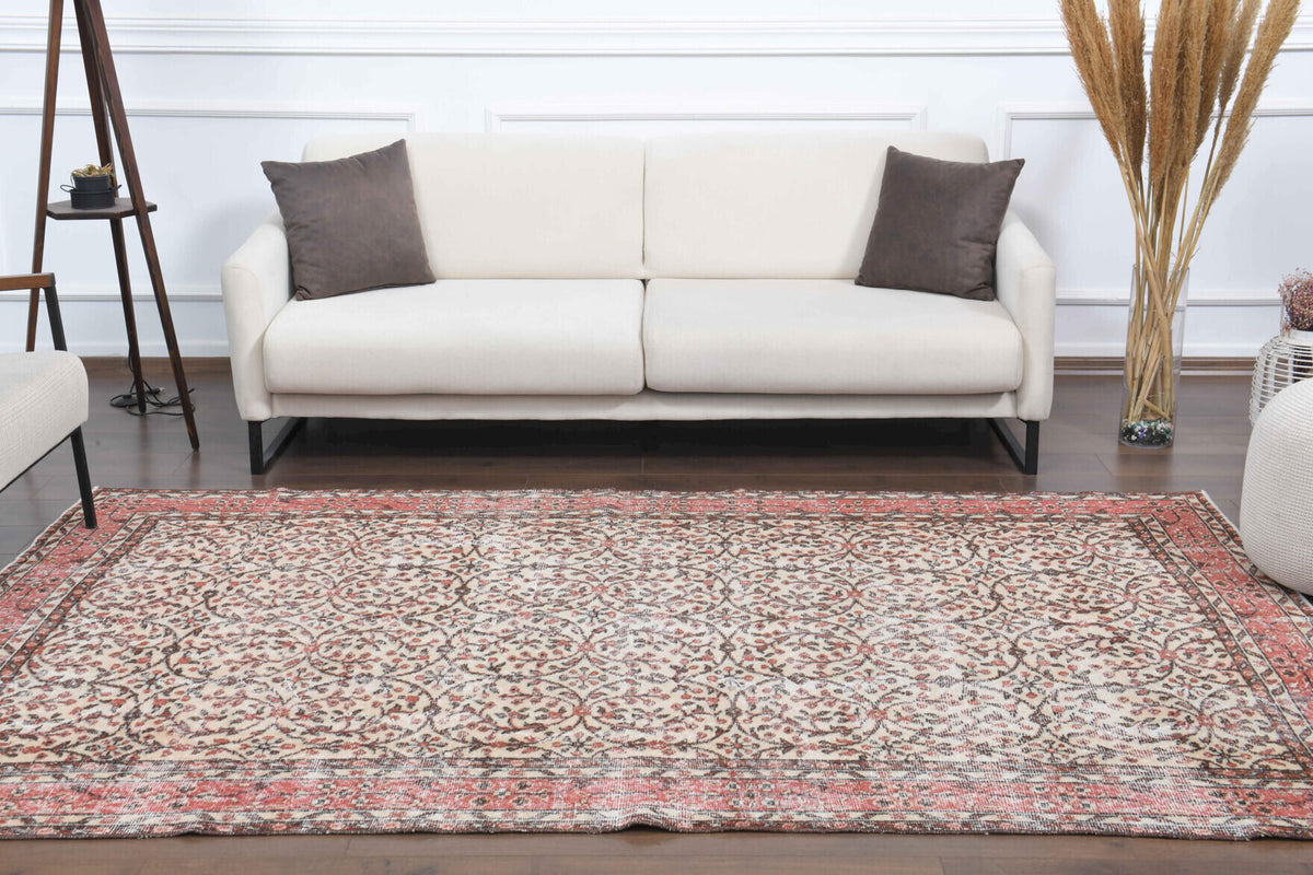 Phaenochoria rug: 1970s handmade Anatolian rug with floral motifs and cotton backing