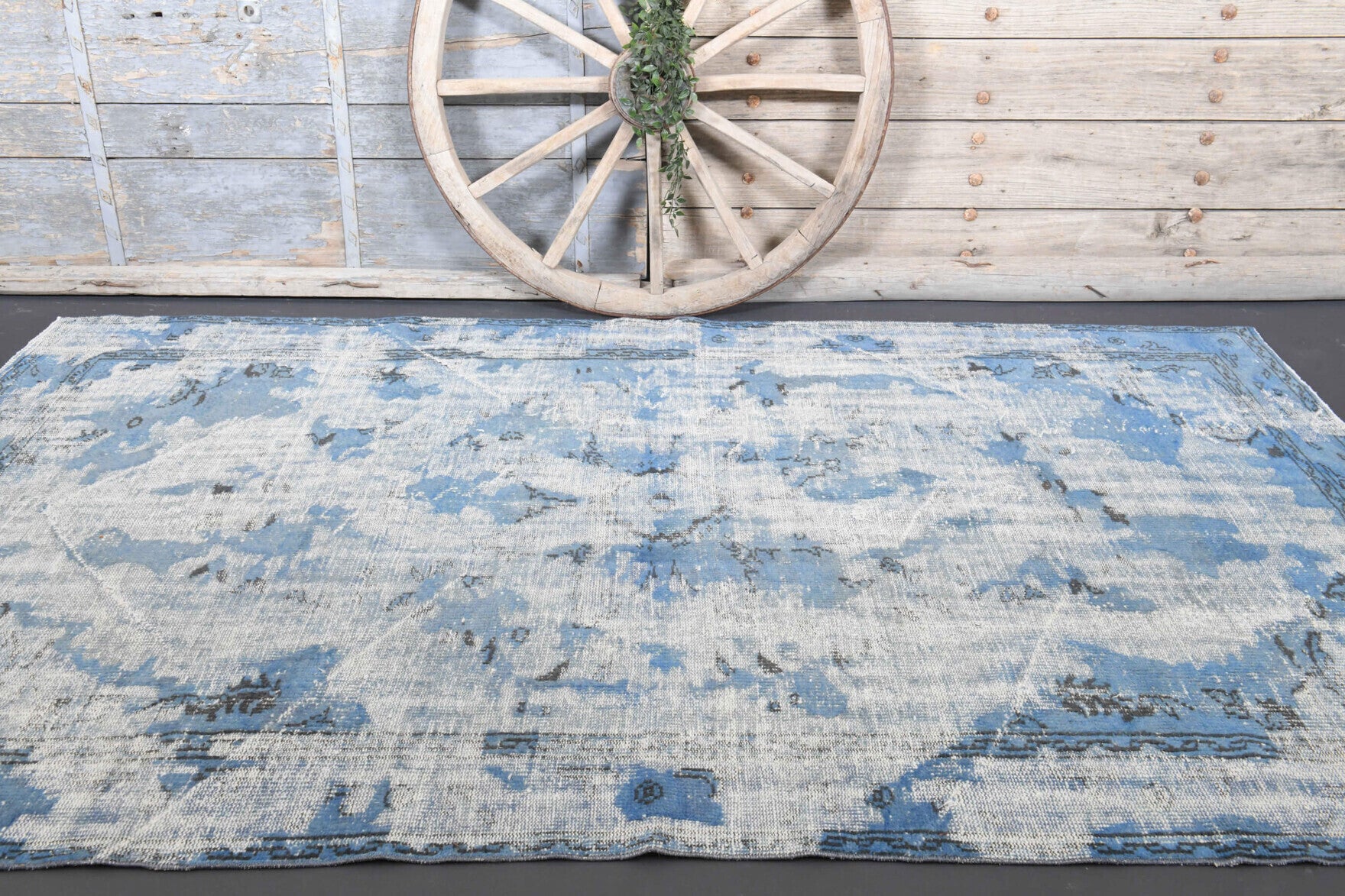 Sedanurpare rug: 1960s handmade Anatolian rug with solid motifs and cotton backing