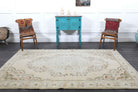 Hosyarnaz rug: 1970s handmade Anatolian rug with oriental motifs and cotton backing