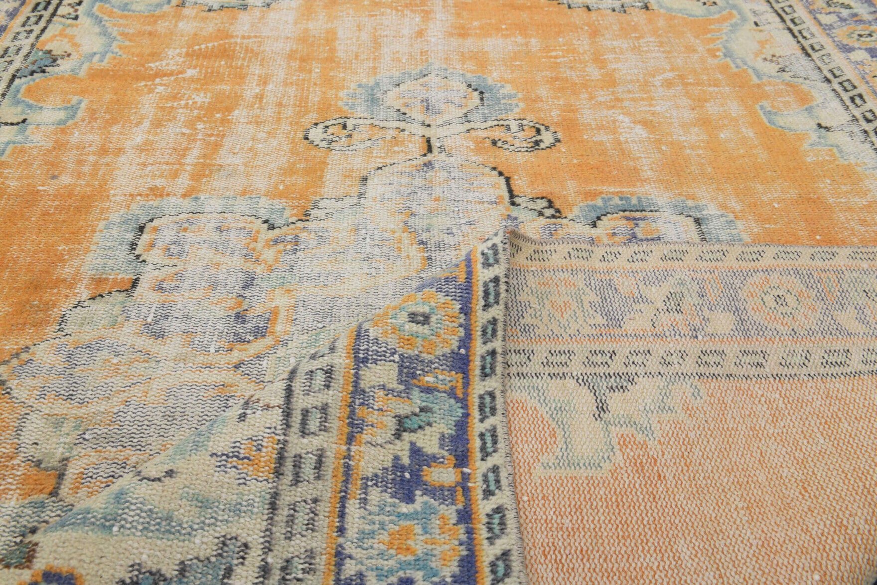 Hand-crafted Anatolian distressed vintage rug Kalliphaessa in wool, 1960s
