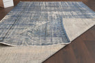 Hand-crafted Anatolian distressed vintage rug Mercan in wool, 1950s