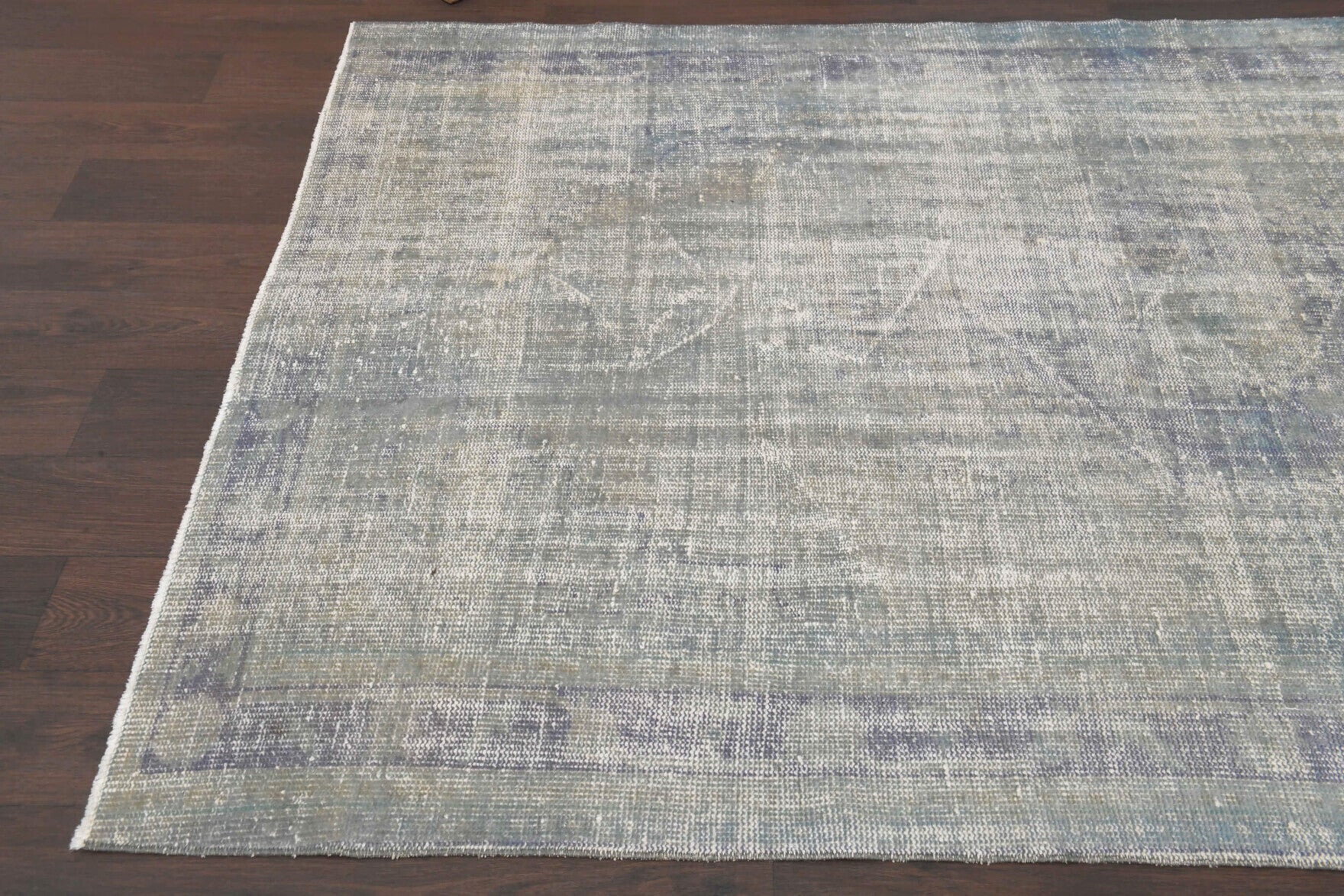 One-of-a-kind 1950s Anatolian distressed vintage area rug in wool, 5'6" x 8'8"