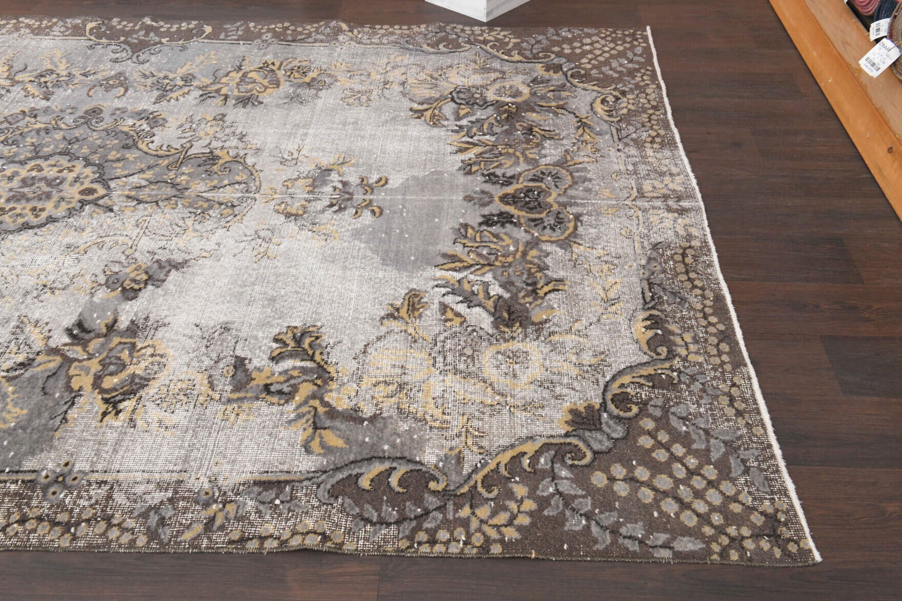 Charitopetra rug: 1970s handmade Anatolian rug with oriental motifs and cotton backing