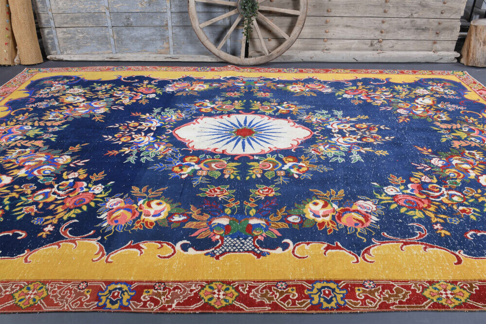 Phemesthene rug: 1970s handmade Anatolian rug with medallion motifs and cotton backing
