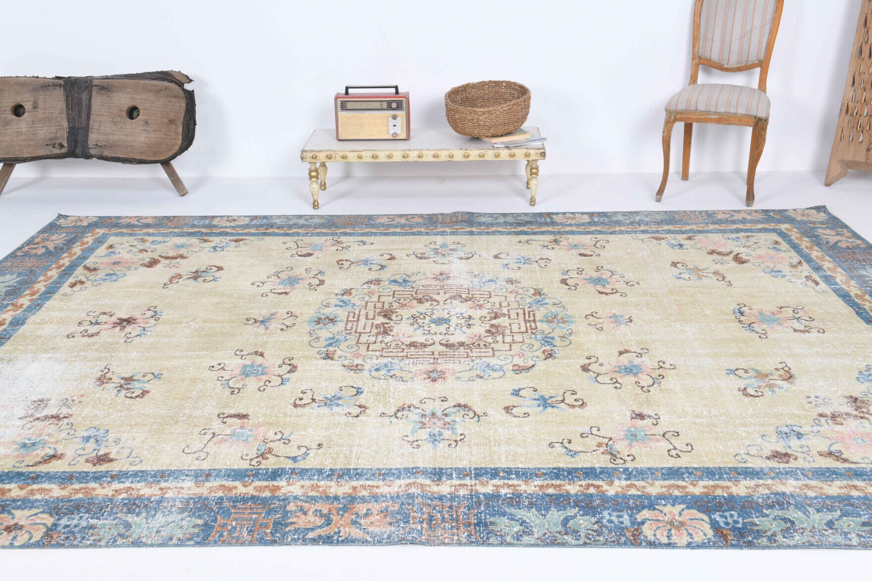 Petromira rug: 1970s handmade Anatolian rug with oriental and bordered motifs and cotton backing