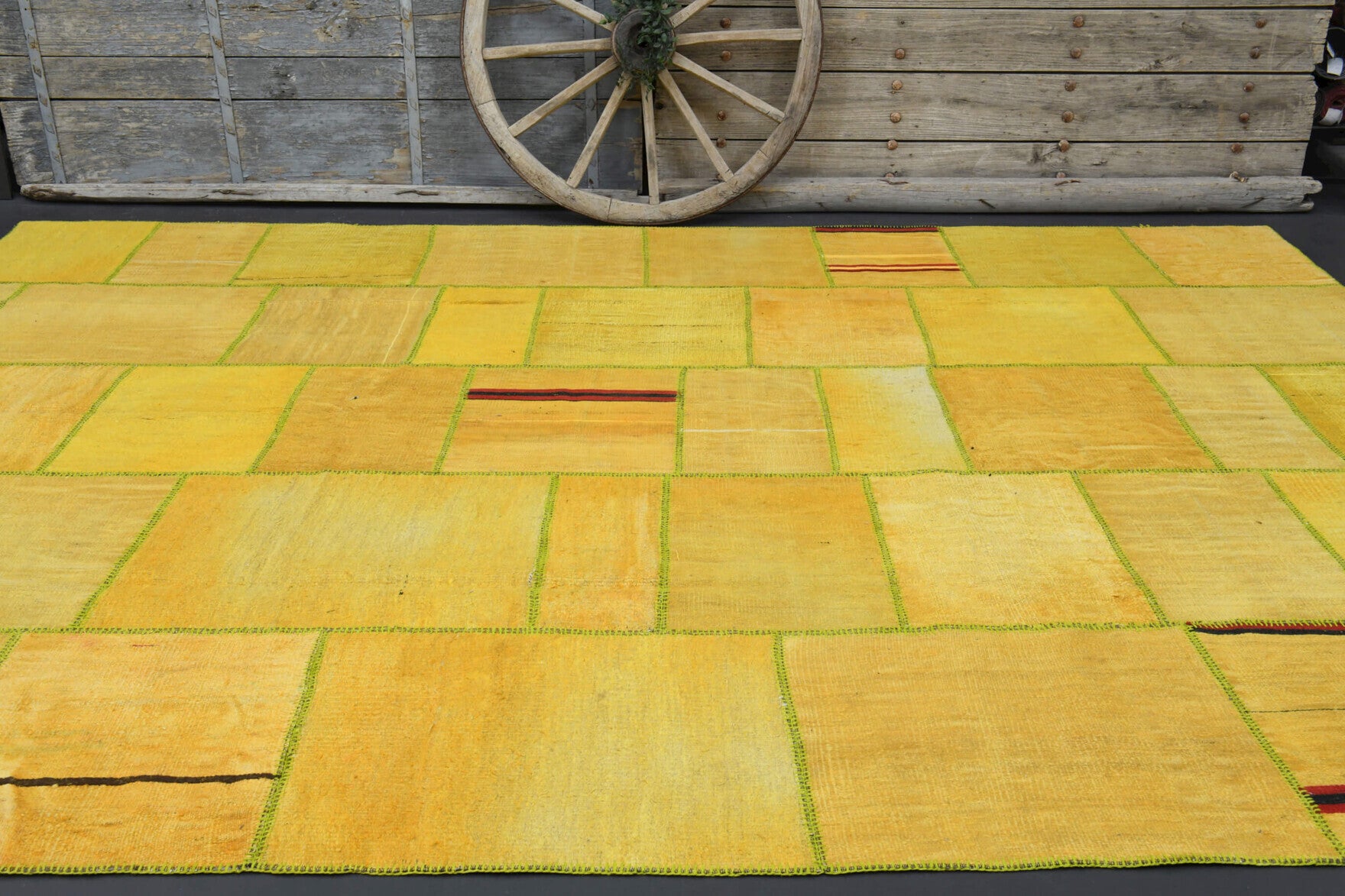 Akiksultan rug: 1970s handmade Anatolian rug with solid motifs and fabric backing