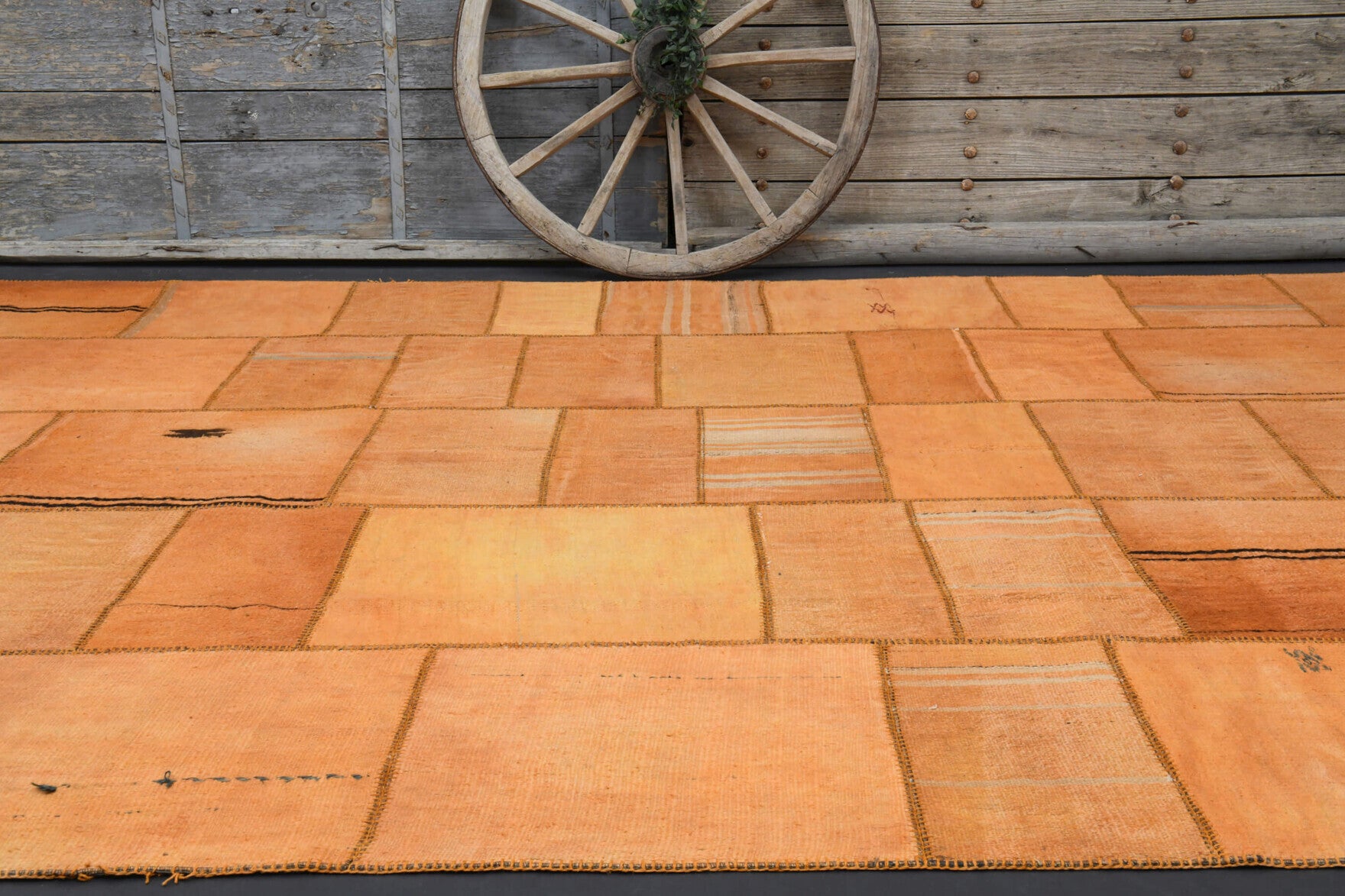 Akiksever rug: 1970s handmade Anatolian rug with solid motifs and fabric backing