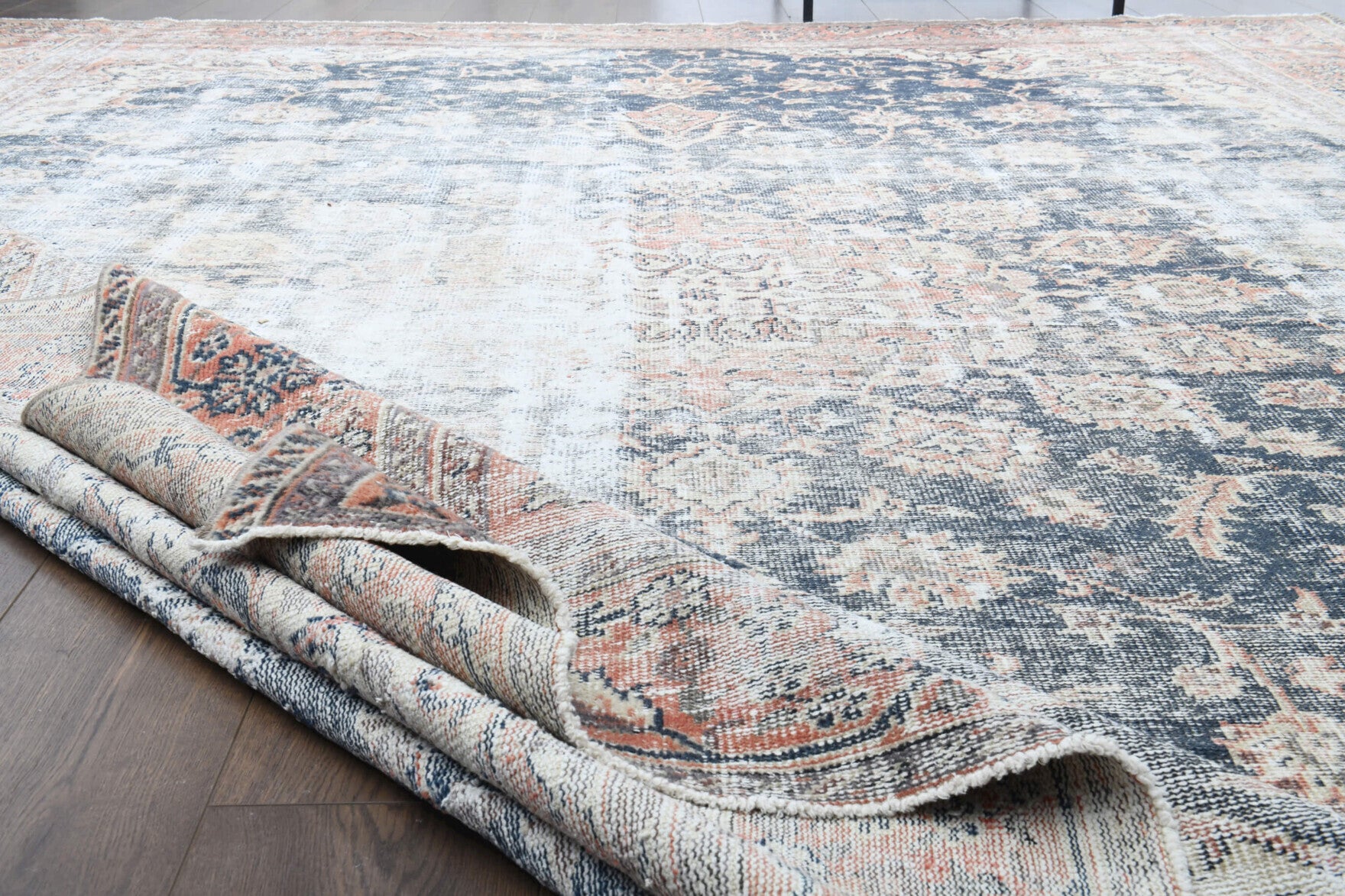 Mahgun rug: 1960s handmade Anatolian rug with oriental motifs and cotton backing