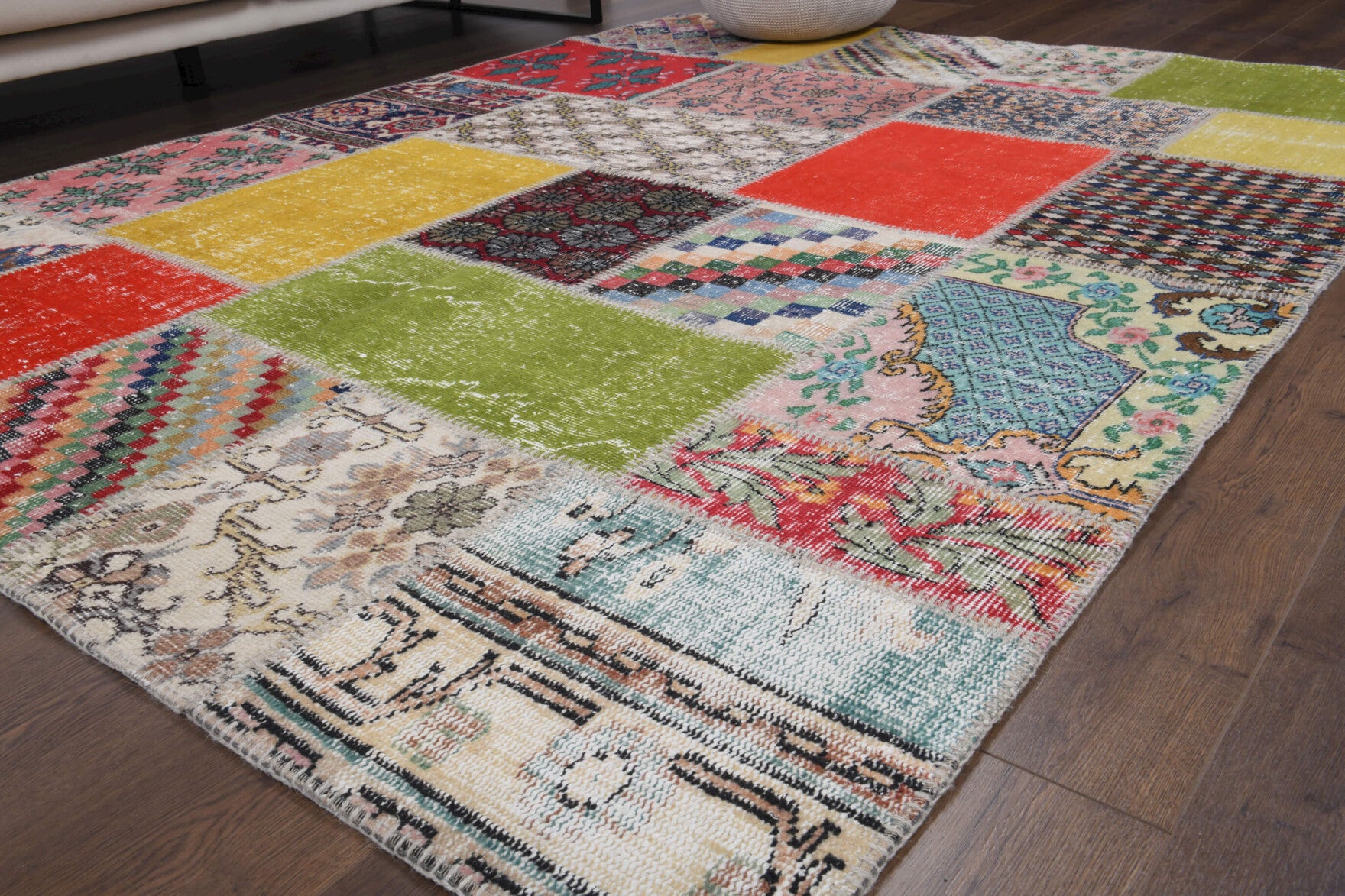 Ceylanyaz rug: 1970s handmade Anatolian rug with patchwork motifs and fabric backing