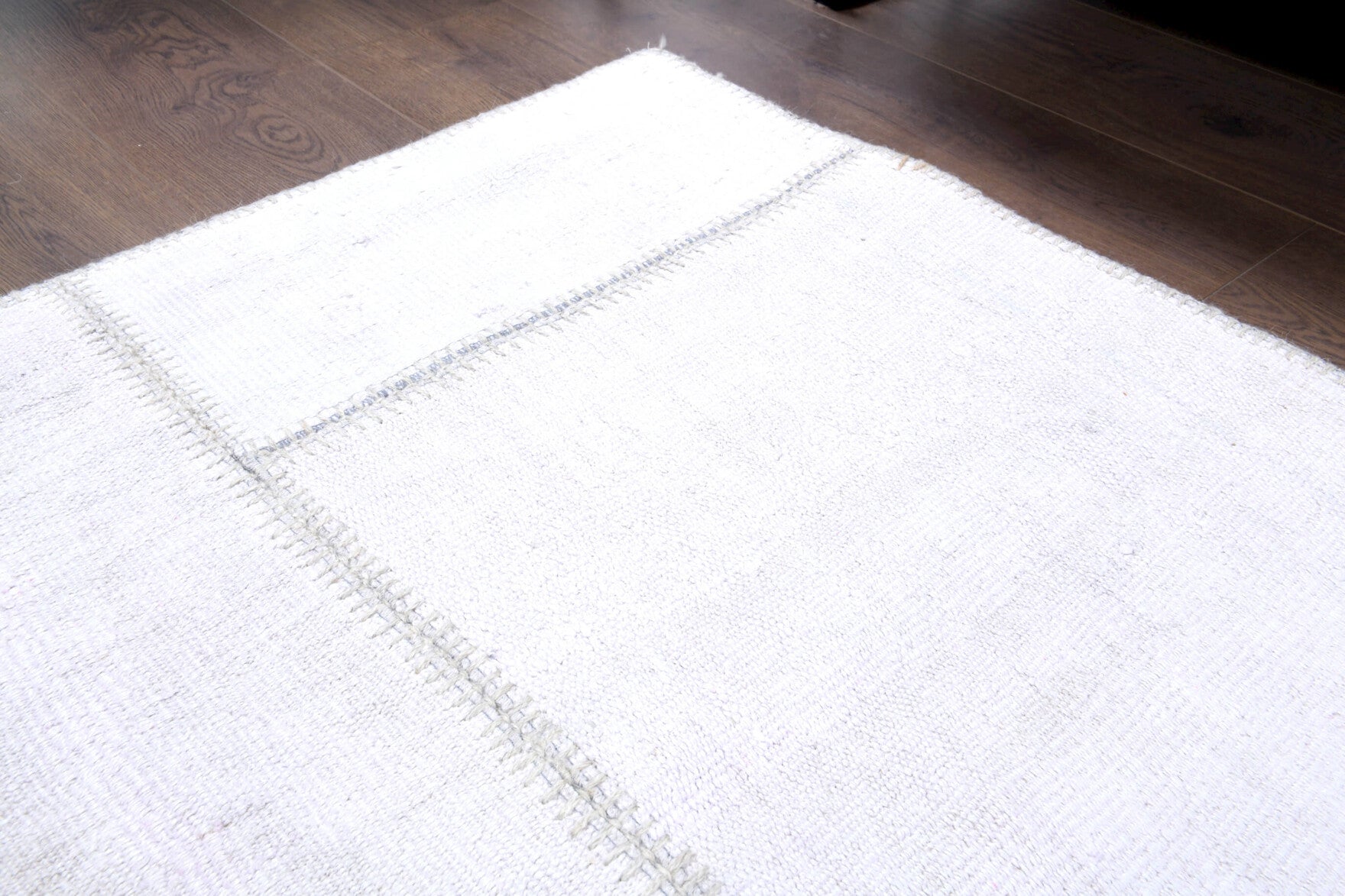 Cerensultan rug: 1970s handmade Anatolian rug with solid motifs and fabric backing