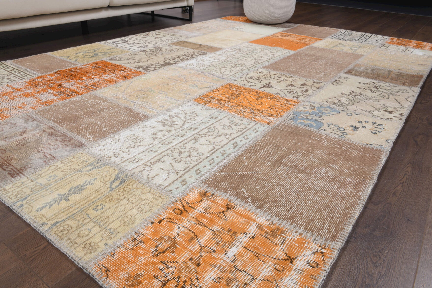 Charitothalia rug: 1970s handmade Anatolian rug with floral motifs and fabric backing