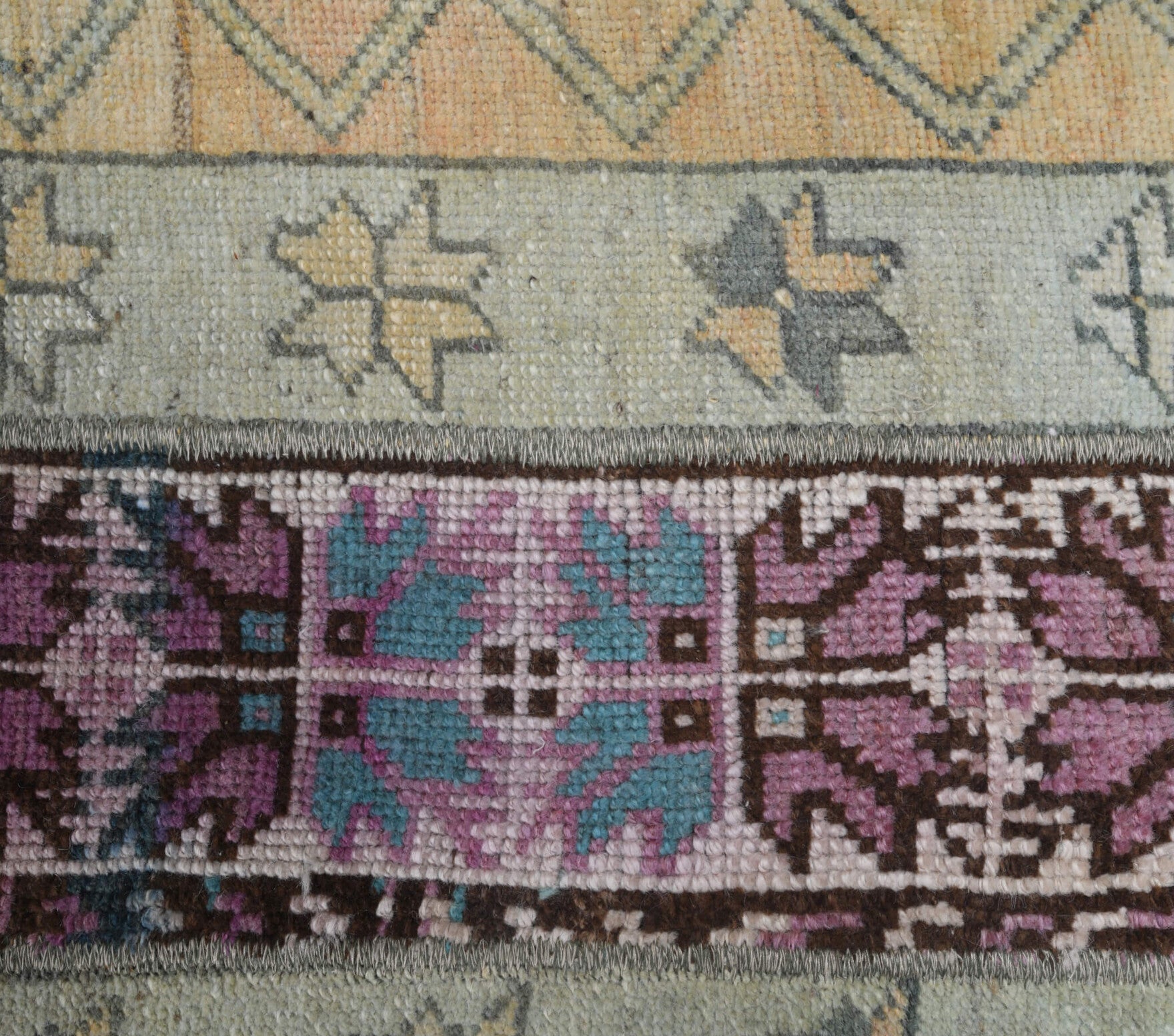 Ilginefsan runner: 1970s handmade Anatolian runner with ikat motifs and fabric backing