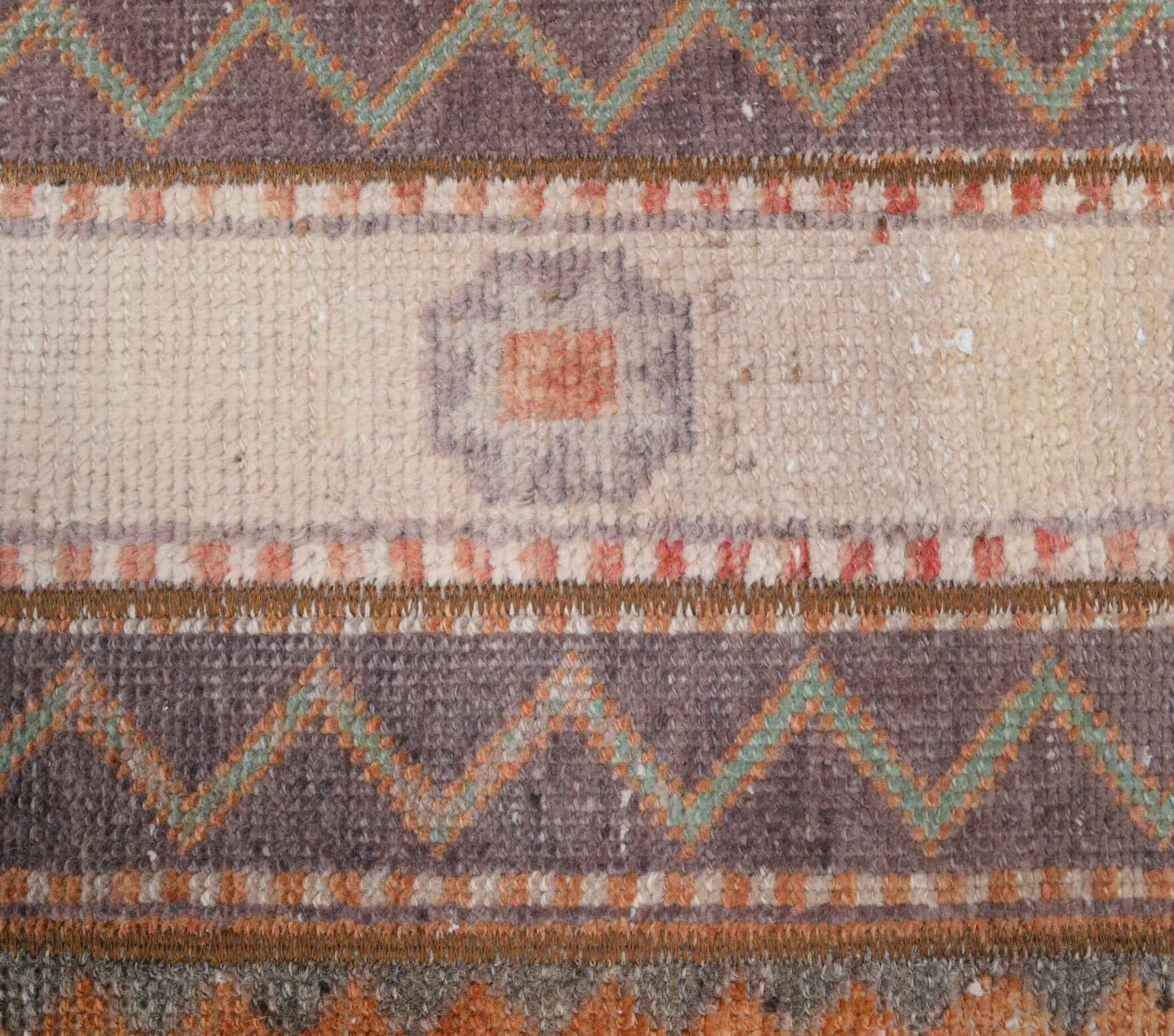 Iasogenia runner: 1970s handmade Anatolian runner with oriental motifs and fabric backing