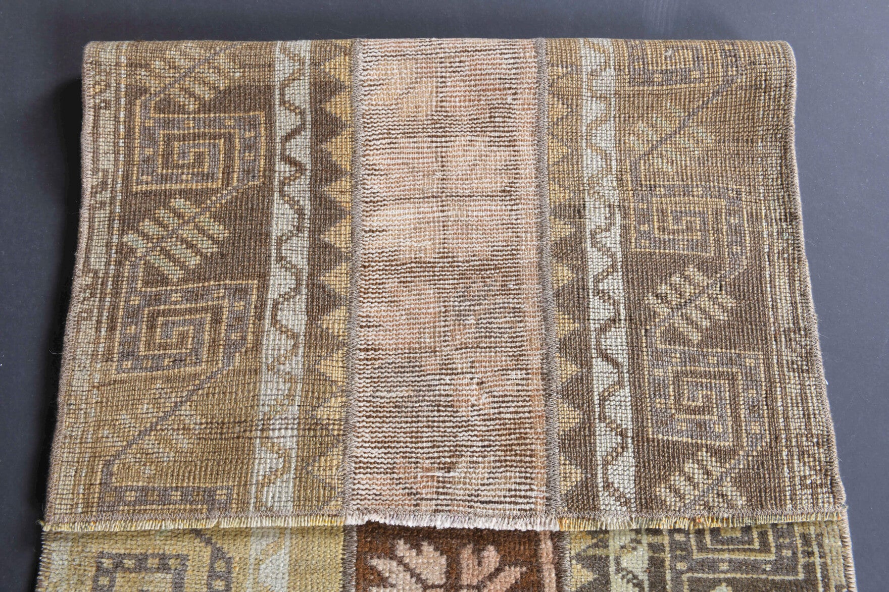 Hippophora runner: 1970s handmade Anatolian runner with ikat motifs and fabric backing