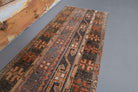 Hippophaessa runner: 1970s handmade Anatolian runner with tribal motifs and fabric backing