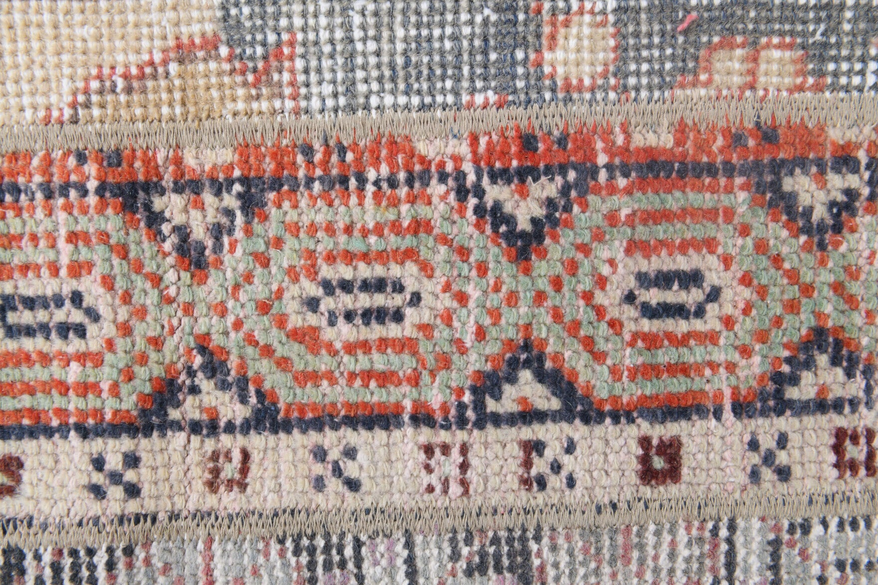 Rhoda rug: 1970s handmade Anatolian rug with oriental motifs and fabric backing