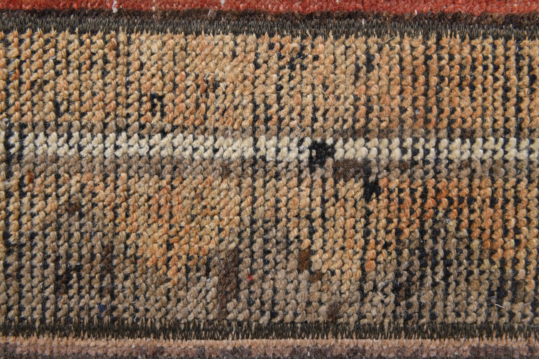 Reyhansel rug mat: 1970s handmade Anatolian rug mat with tribal motifs and fabric backing
