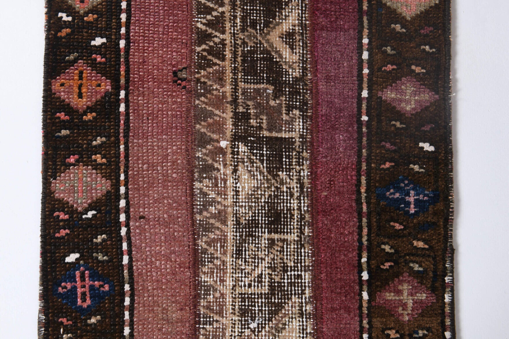 Polypelia runner: 1970s handmade Anatolian runner with ikat motifs and fabric backing