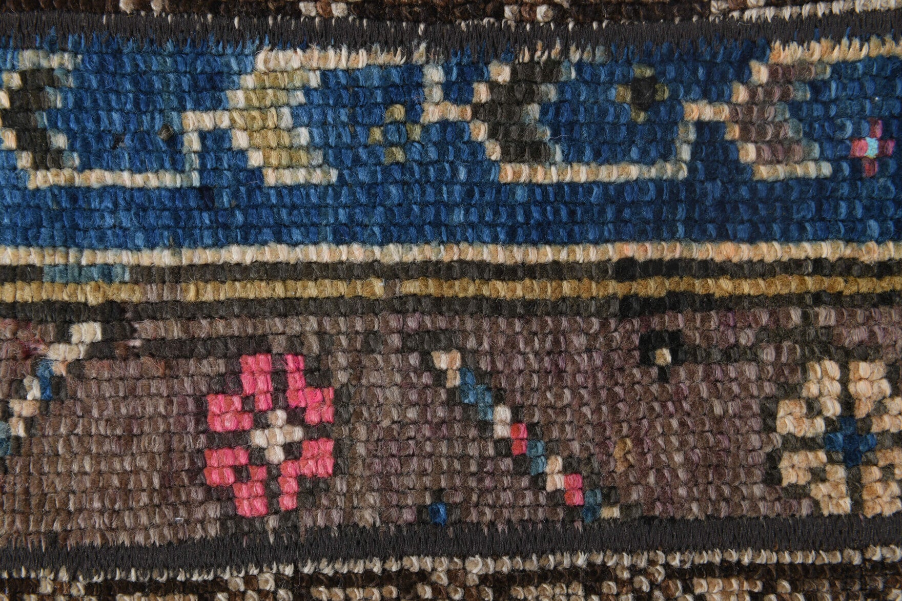 Phaenanthe rug: 1970s handmade Anatolian rug with ikat motifs and fabric backing