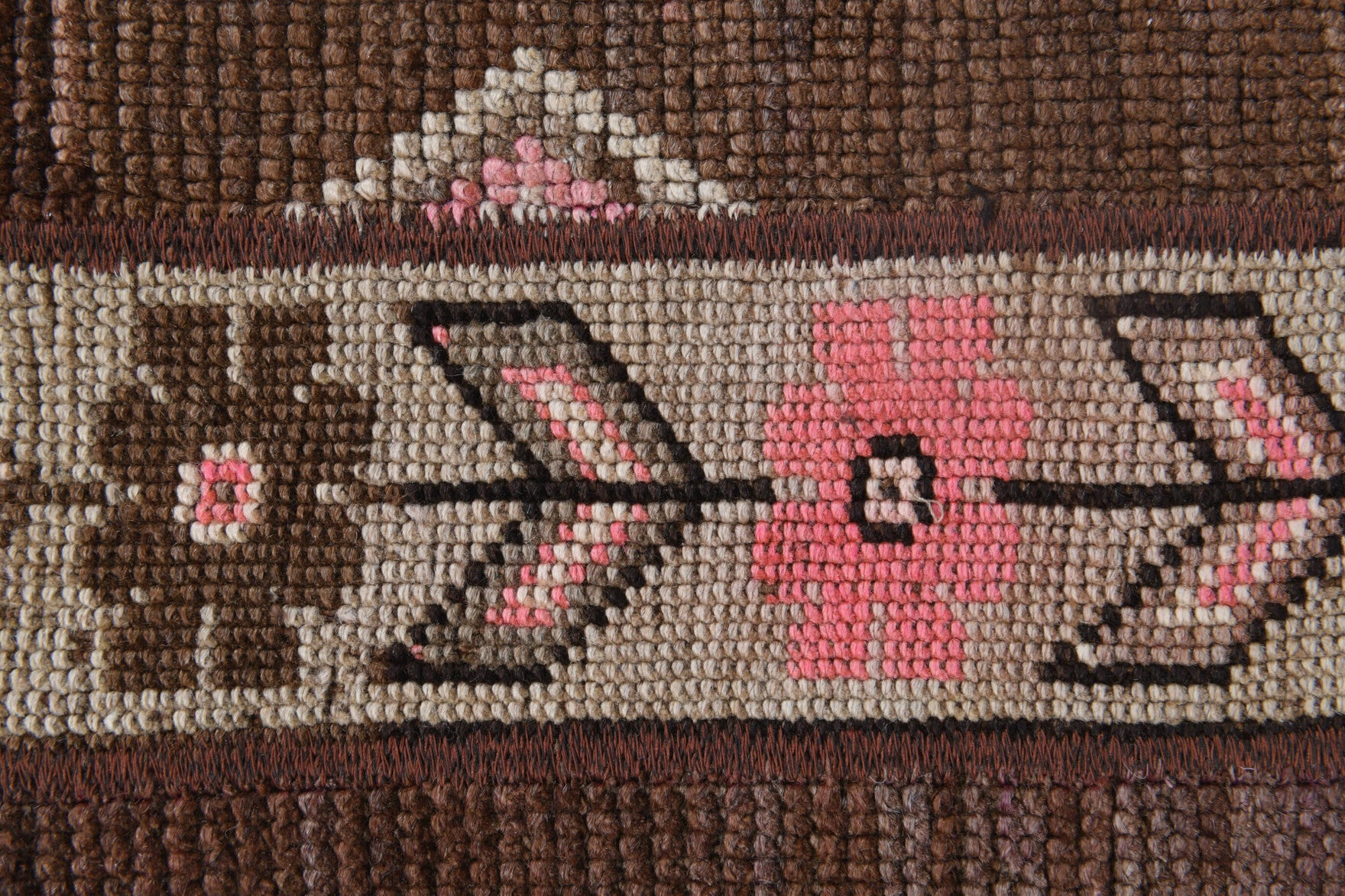 Petromene rug: 1970s handmade Anatolian rug with oriental motifs and fabric backing