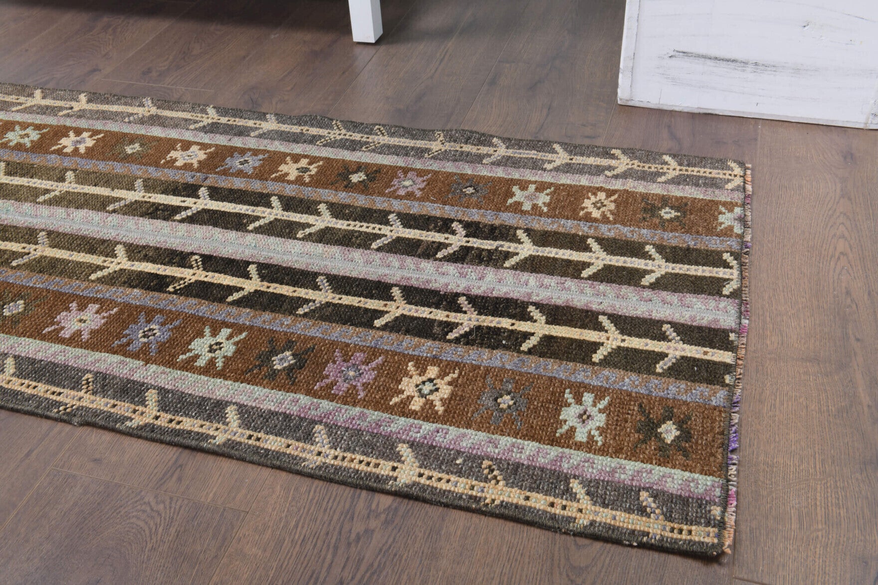 Mihrsultan runner: 1970s handmade Anatolian runner with ikat motifs and fabric backing
