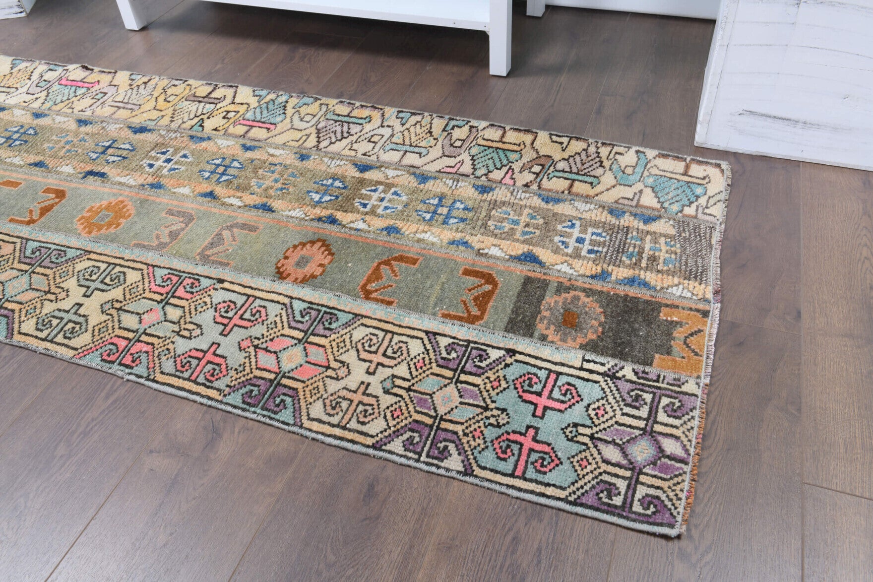 Mercanbike runner: 1970s handmade Anatolian runner with ikat motifs and fabric backing