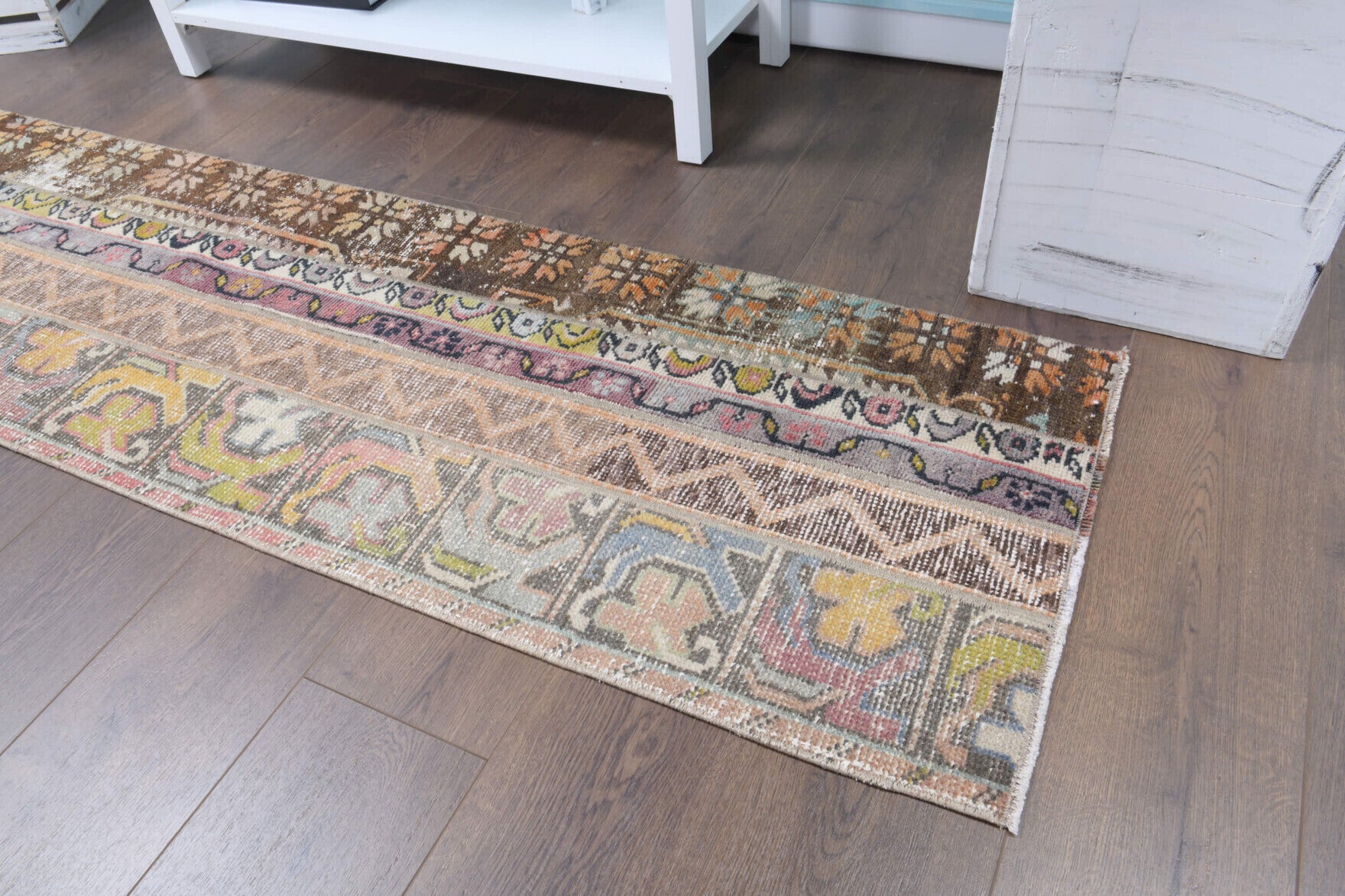 Melissokrateia runner: 1970s handmade Anatolian runner with patchwork motifs and fabric backing