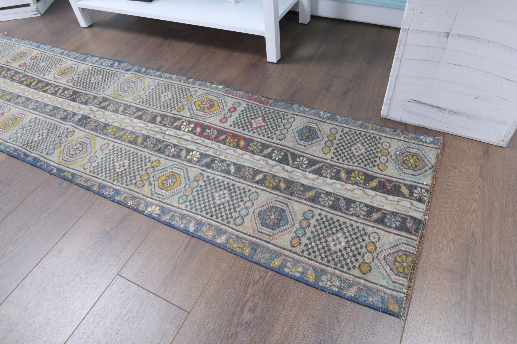 Lysidike runner: 1970s handmade Anatolian runner with patchwork motifs and fabric backing