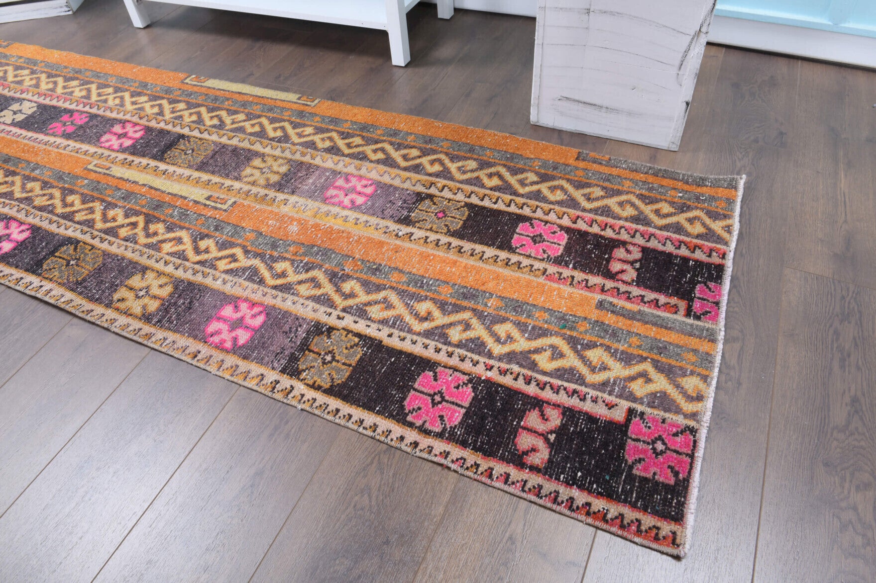 Lebedos runner: 1970s handmade Anatolian runner with patchwork motifs and fabric backing