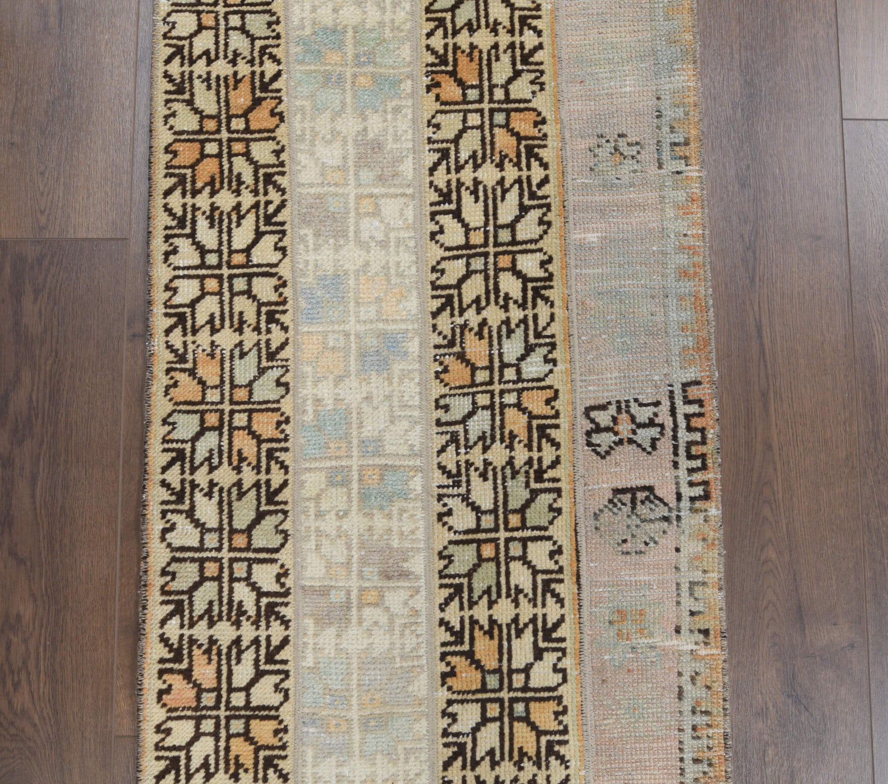 Ilginyaz runner: 1970s handmade Anatolian runner with ikat motifs and fabric backing