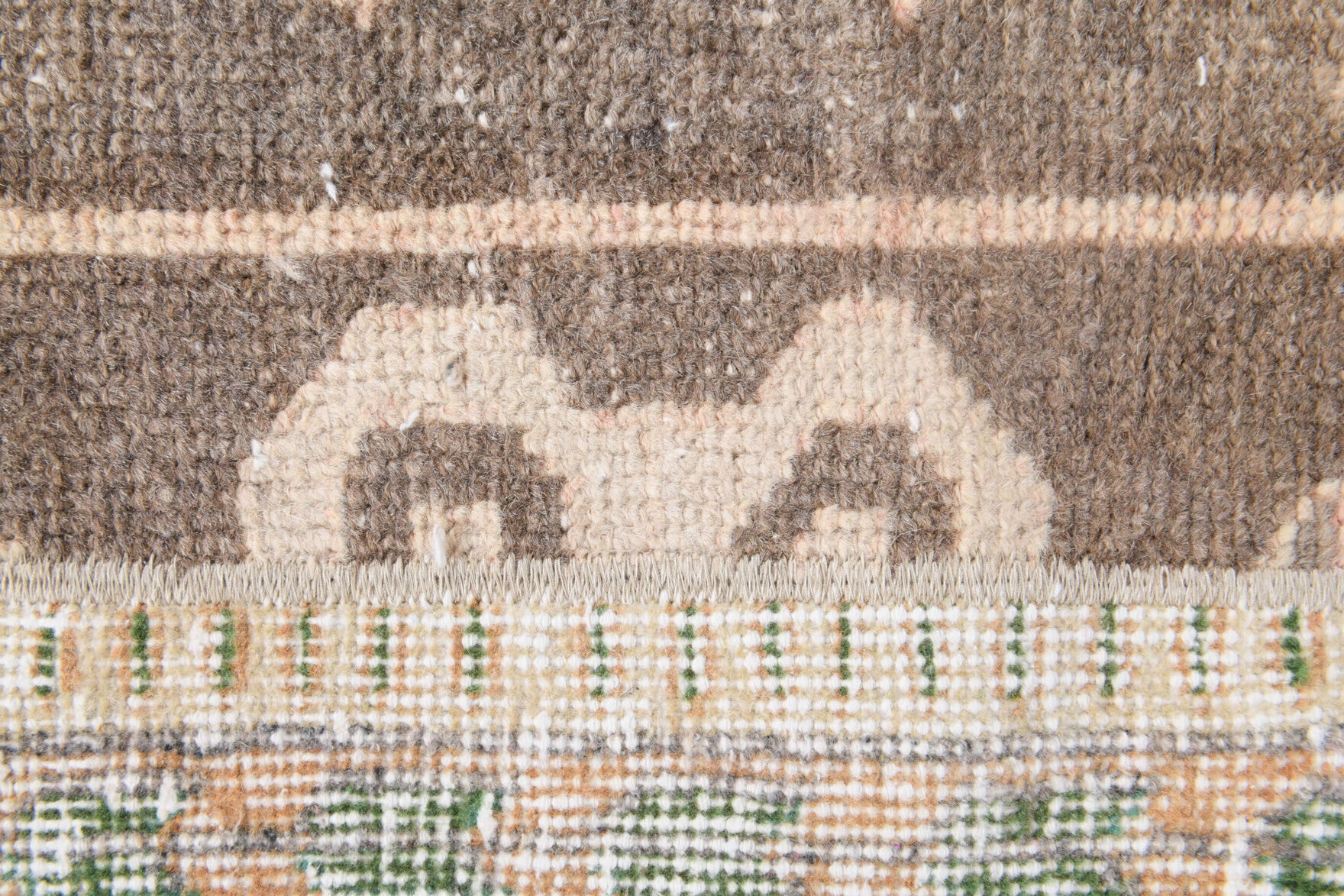 Ruyakusa rug: 1970s handmade Anatolian rug with ikat motifs and fabric backing