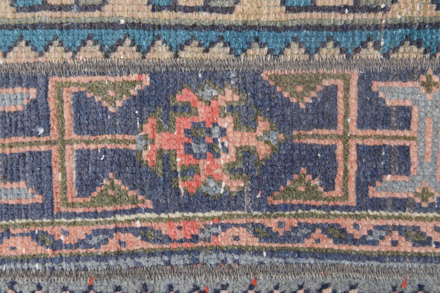 Rukiyat rug: 1970s handmade Anatolian rug with ikat motifs and fabric backing