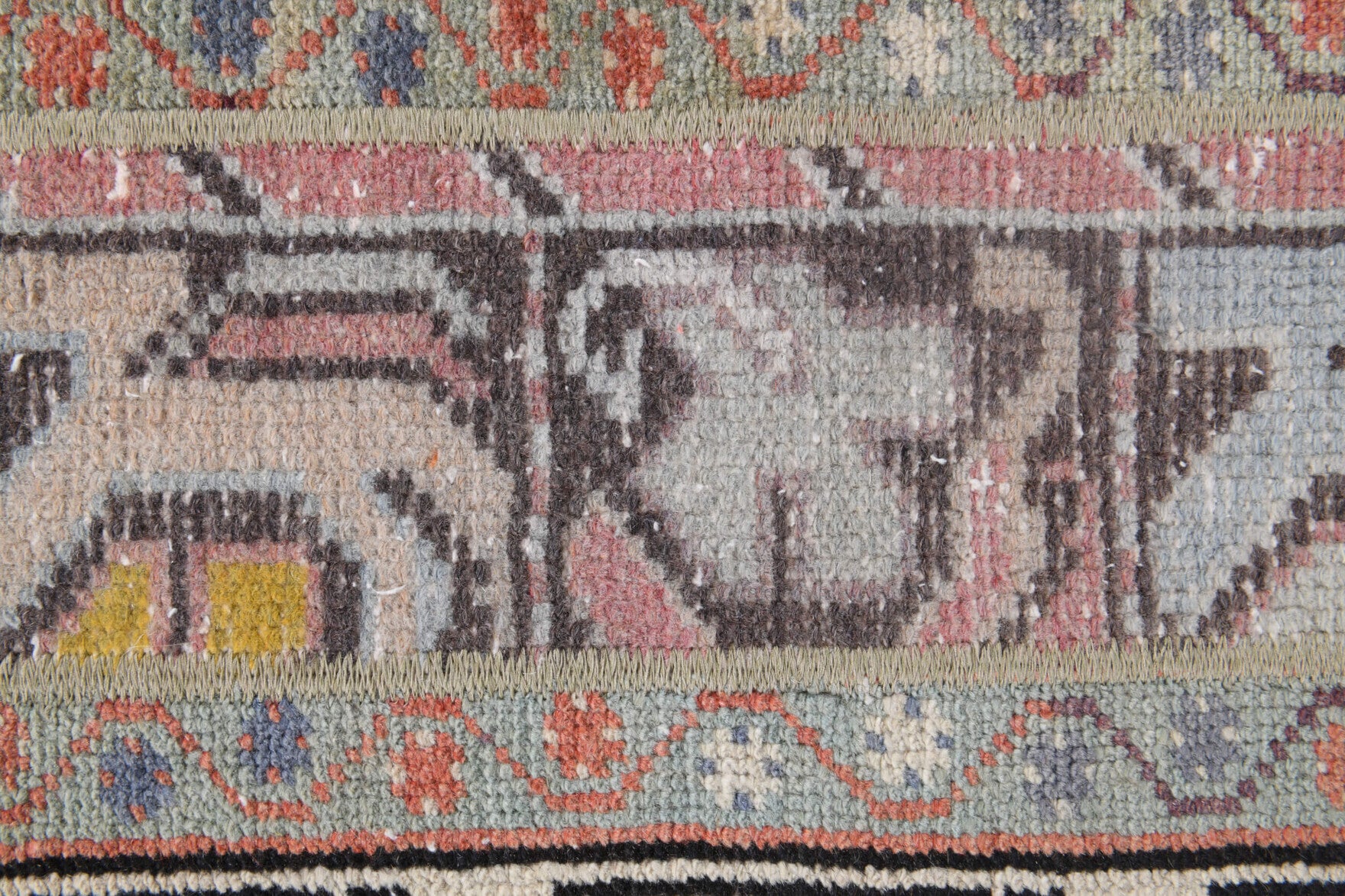 Ruhbahce rug: 1970s handmade Anatolian rug with oriental motifs and fabric backing