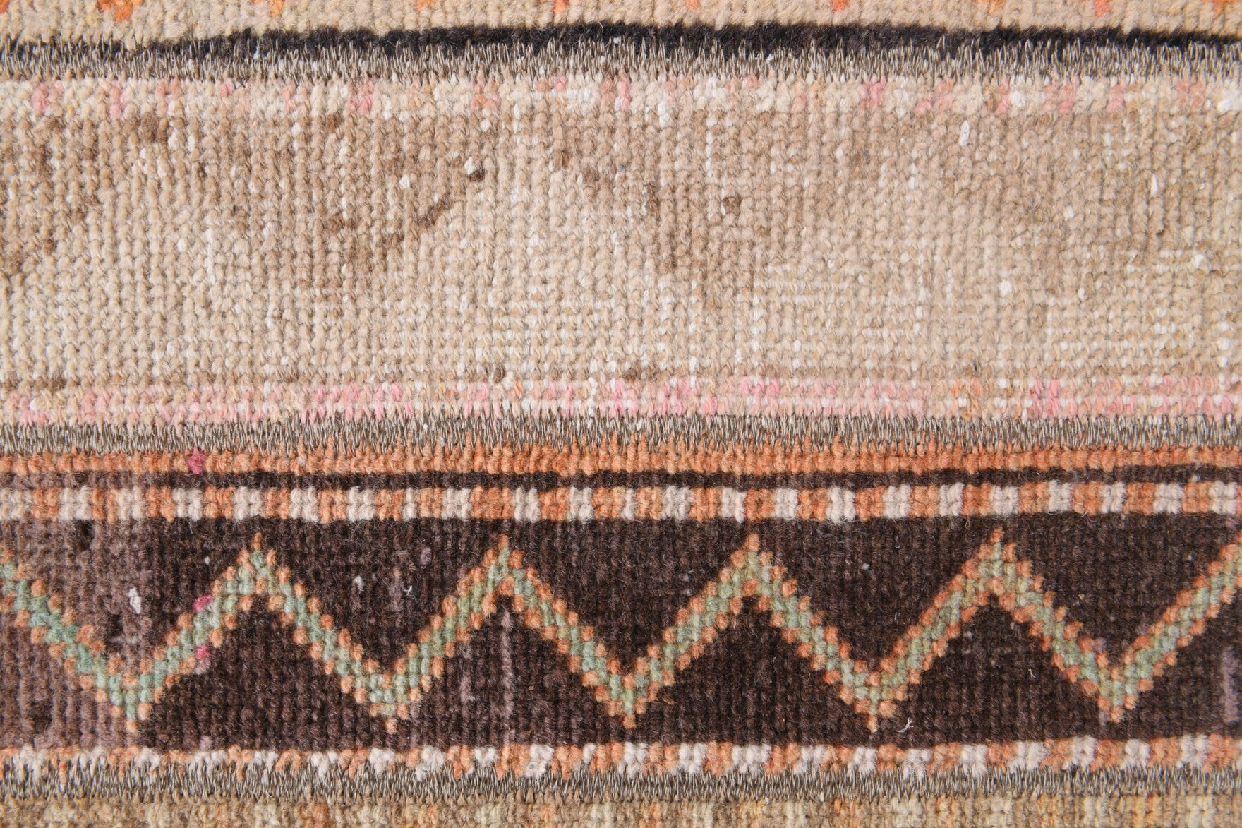Pyrrophaessa rug: 1970s handmade Anatolian rug with patchwork motifs and fabric backing